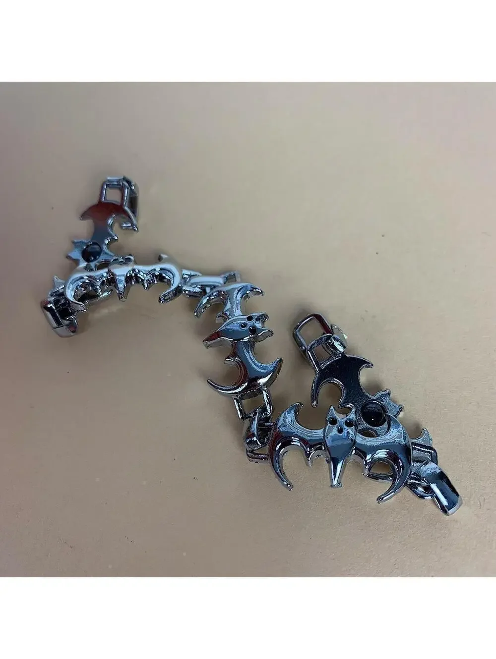Y2k 2000s style grunge opium silver bat pendant bracelet